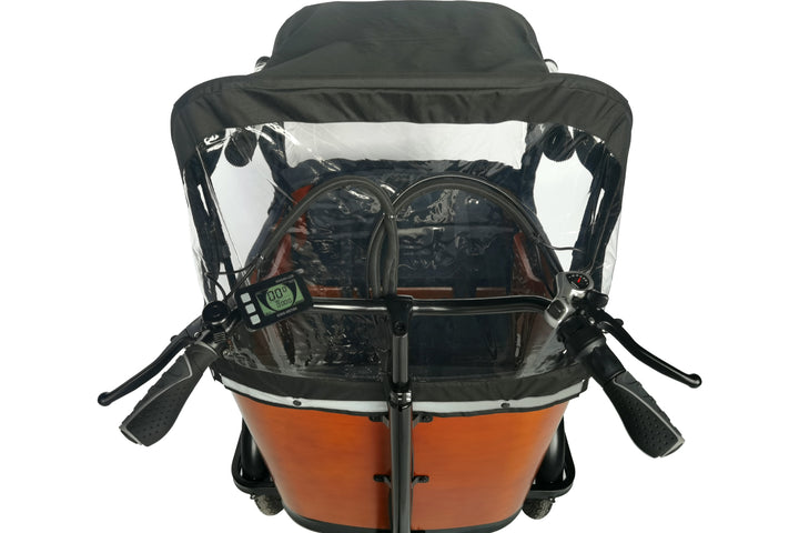 driver view electric cargo bike with wooden storage box and black frame by Dirwin.