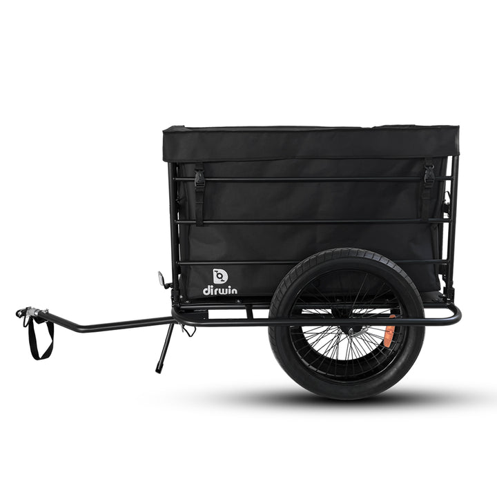 Black cargo bike trailer with sturdy frame and two wheels, designed for easy transportation and storage.
